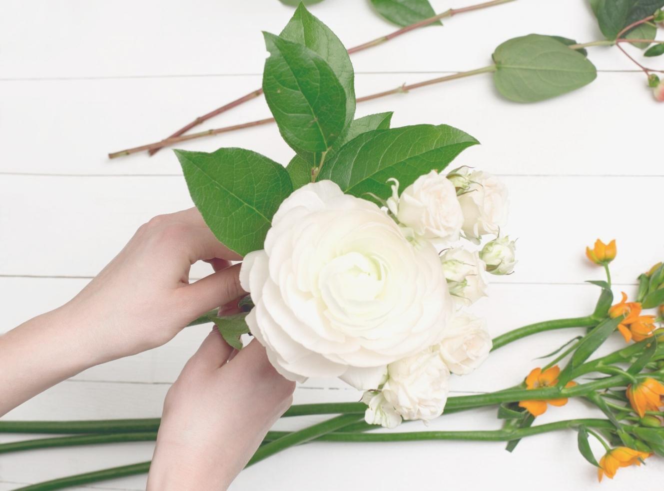 Professional seasonal floral arrangement in commercial setting